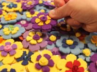 Un fiore dalla Coop. Casa della Gioventu' per omaggiare le donne