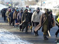 Manifestanti paramilitari durante gli scontri in Ucraina nel gennaio 2014