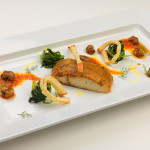 Ombrina in crosta di polenta e porcini, cicoria saltata e raguse in porchetta