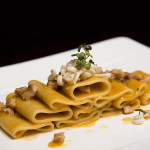 Paccheri al ragu di coniglio con calamari arrostiti