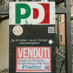Cartello della sede del PD imbrattata da Forza Nuova