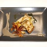 Ombrina arrostita, crema di pane, carciofi chips ed emulsione alla liquirizia