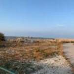 Rifiuti dell'alluvione accatastati nell'avamporto