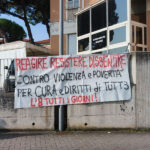 Striscione apparso l'8 marzo 2025 all'ospedale di Senigallia