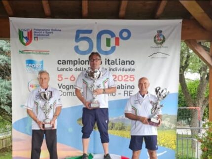 Ruzzola - I 3 campioni italiani: a sinistra Silvano Malatesta di Belvedere Ostrense, al centro Mauro Sabatini da Nocera Umbra e a sinistra Papi Gervasio da Trecastelli