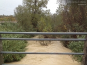 Il Nevola in piena a Passo Ripe, visto da un ponte