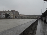 Il Misa in piena da via Portici Ercolani